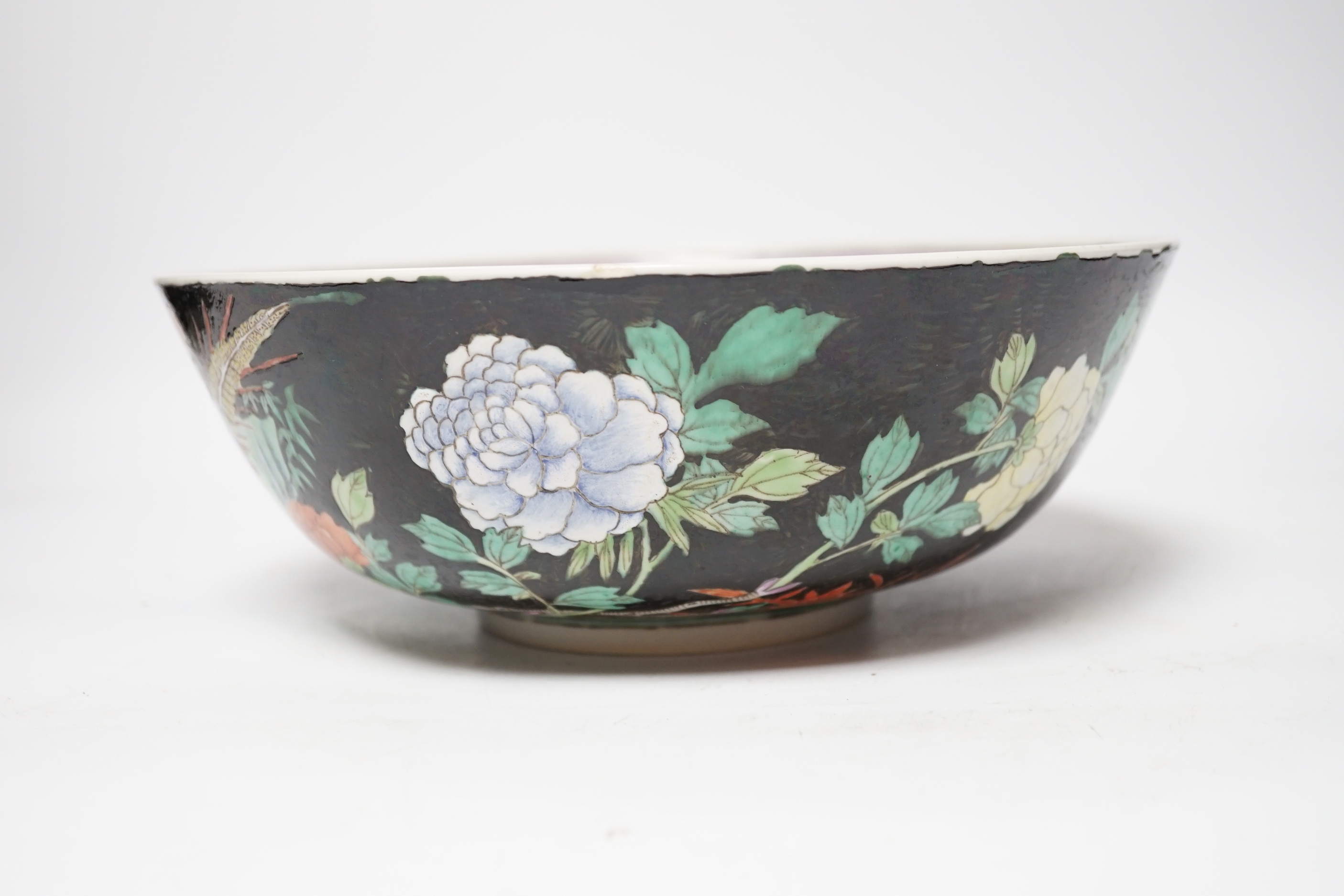 A 19th century Chinese famille noire bowl, 26cm diameter